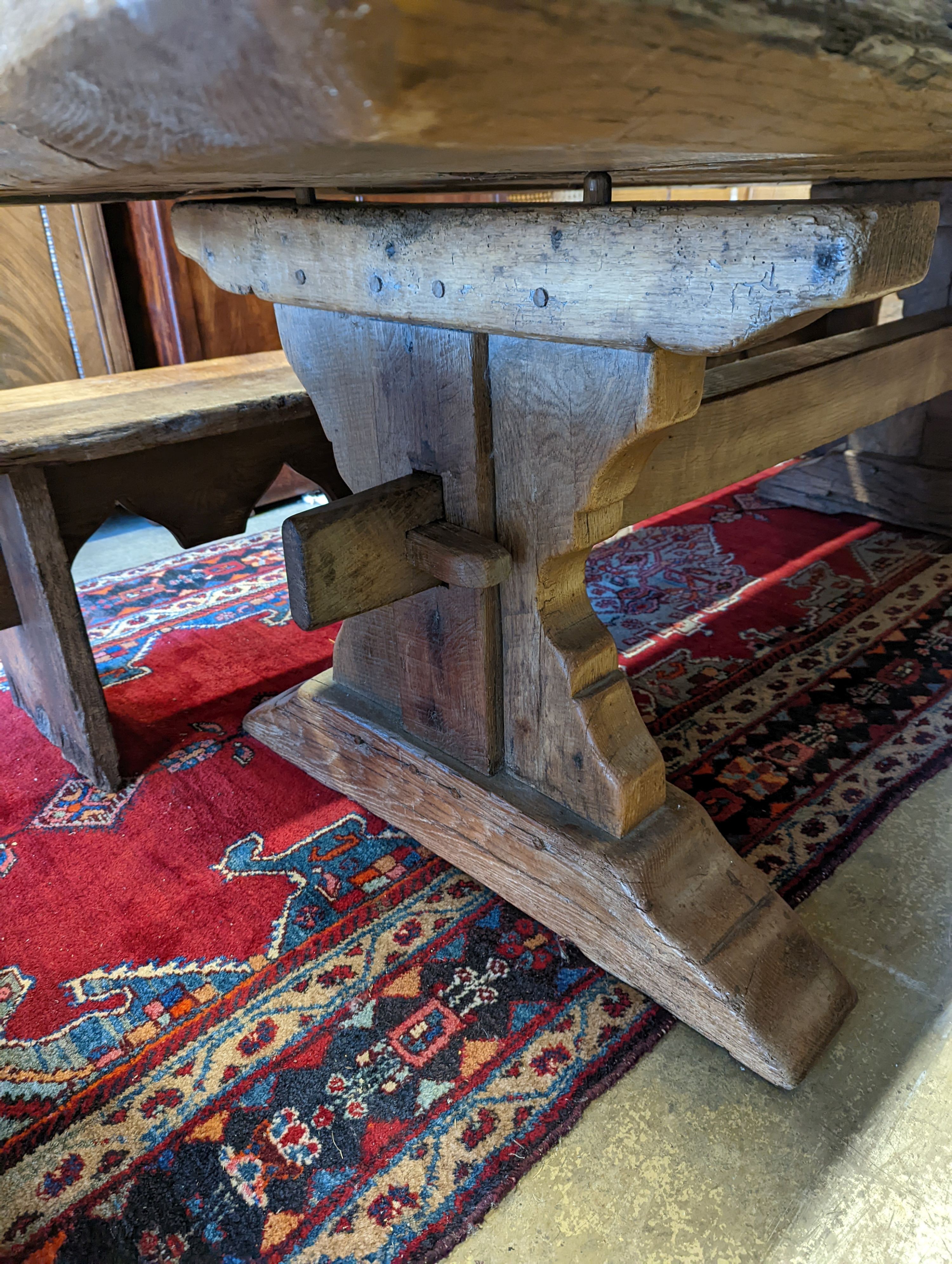 An 18th century style oak refectory dining table with planked top, length 228cm, depth 96cm, height 74cm